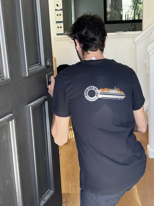 Dawn & The Lock technician installing a deadbolt